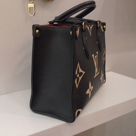 Louis Vuitton Vintage Bicolor On The Go PM
